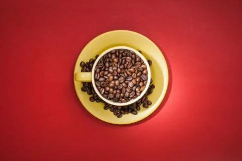 Coffee cup with coffee beans. Stock Photos