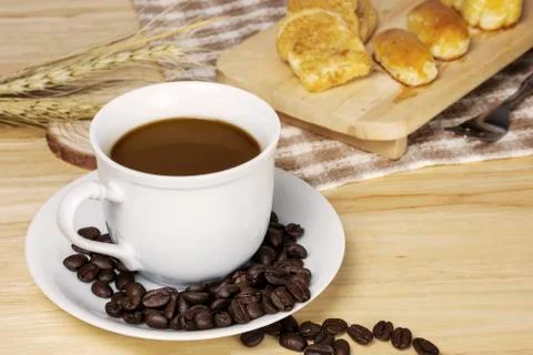 Coffee cup with coffee beans Stock Photos