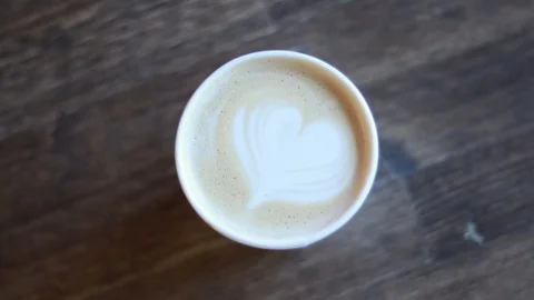 Coffee. Cup coffee with copy space. A cup of fragrant coffee on a wooden table. Stock Footage 100143918