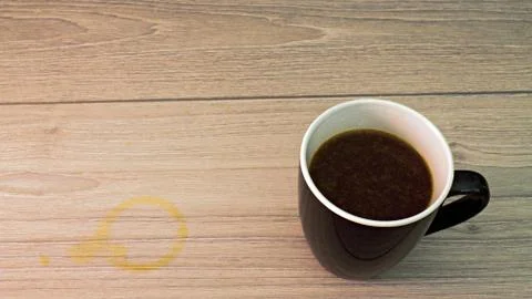 Coffee cup with coffee stain Stock Photos