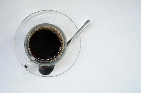 Coffee cup with coffee on a table Stock Photos