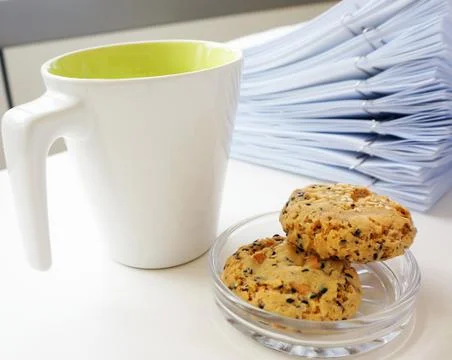 Coffee cup with cookie for break Stock Photos