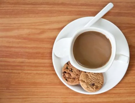 Coffee cup with cookie . Stock Photos