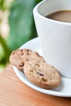 Coffee cup with cookie . Stock Photos