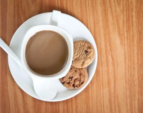 Coffee cup with cookie . Stock Photos