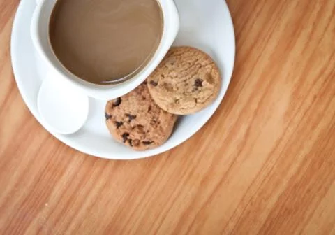 Coffee cup with cookie . Stock Photos