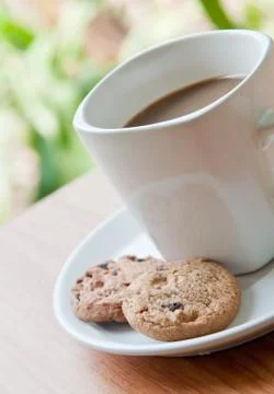 Coffee cup with cookie . Stock Photos