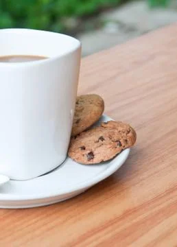 Coffee cup with cookie . Stock Photos