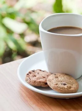 Coffee cup with cookie . Stock Photos