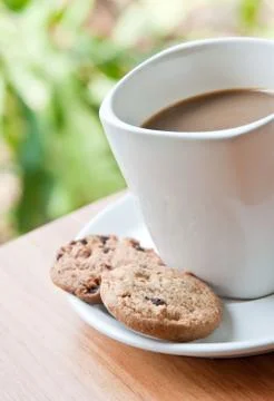 Coffee cup with cookie . Stock Photos