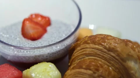 Coffee cup, croissant and fruit- breakfast Stock Footage 326631608