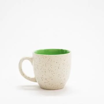 Coffee cup with dot pattern Stock Photos