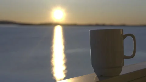 Coffee cup during sunrise Stock Footage 266456469