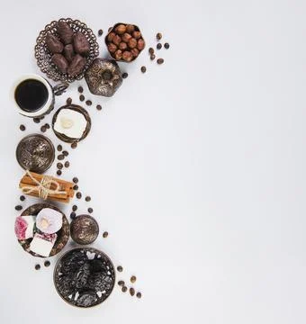 Coffee cup with eastern sweets hazelnuts. High quality photo Stock Photos