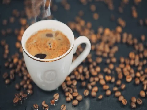 Coffee. Cup of Hot Coffee Espresso. Coffee or Tea. Slow motion Stock Footage 73668304