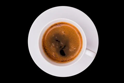 Coffee cup isolated on solid black background. coffee top view Stock Photos