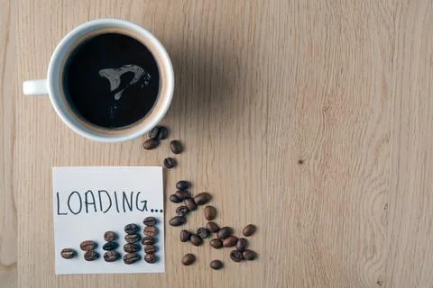 Coffee cup with loading progress bar made of beans Stock Photos