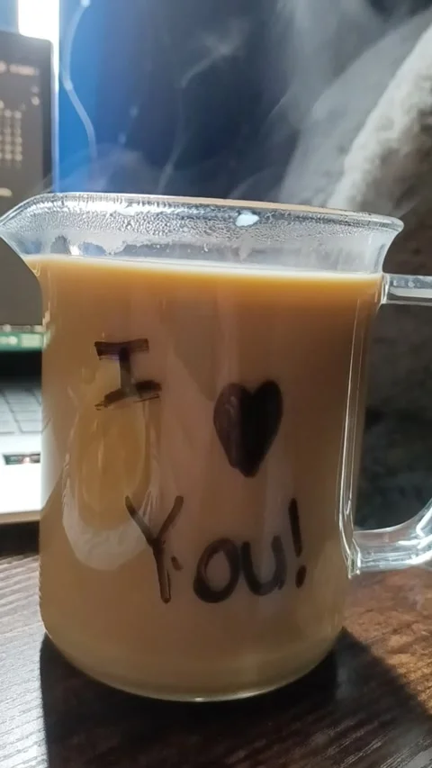 Coffee Cup with an a love message drawn on it Stock Footage 319914329