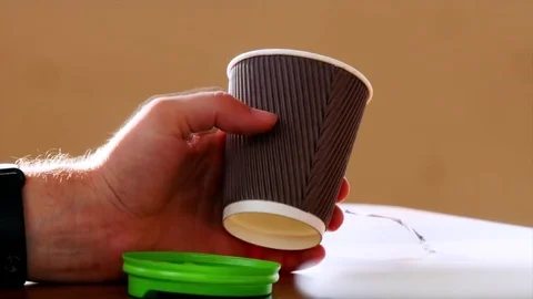 Coffee cup in man's hand Video stock 82695787