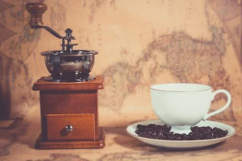 Coffee cup on the map Stock Photos