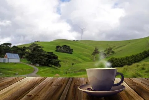 Coffee cup on the mountains background Stock Photos