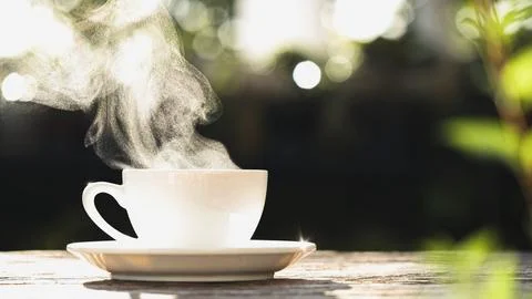 Coffee Cup, Mug. Close-up natural steam smoke of coffee from hot coffee cup Stock Photos