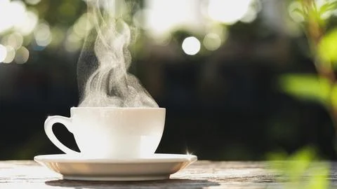 Coffee Cup, Mug. Close-up natural steam smoke of coffee from hot coffee cup Stock Photos