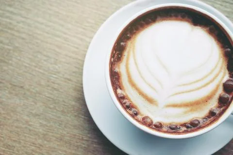Coffee cup on old table. Top view with copyspace Stock Photos
