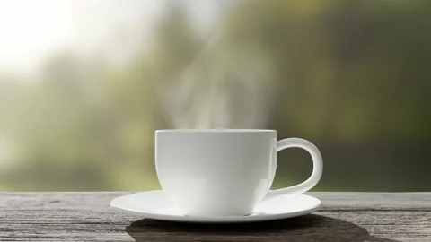Coffee cup or tea cup on saucer with natural steam smoke ,slow motion 動画素材 232112414