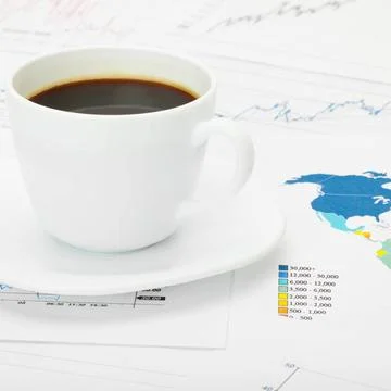  Coffee cup over world map and financial documents Coffee cup over world m... Stock Photos