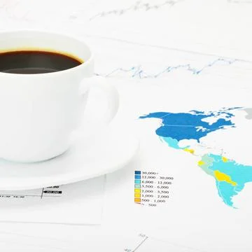 Coffee cup over world map and financial documents Coffee cup over world ma... 스톡 사진
