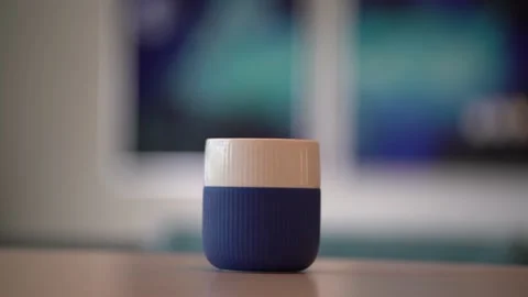 Coffee cup, panning smoothly, 4K Slowmotion Stock Footage 149875985