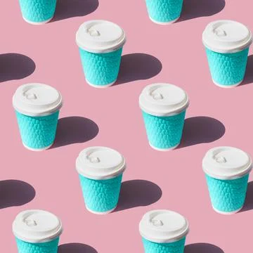 Coffee cup pattern on pink background. Textured turquoise paper cups with whi Stock Photos
