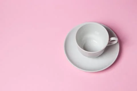 Coffee cup on a pink background.  Stock Photos