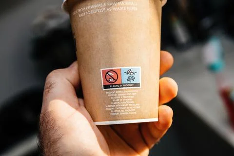 Coffee Cup Plastic Warning Label Closeup Paris Stock-Fotos