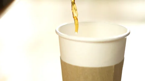 Coffee cup pour slow motion tight Vídeos de archivo 38767797