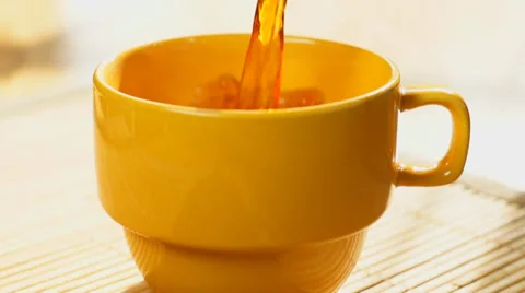 Coffee cup pour slow motion yellow Vídeos de archivo 38767824