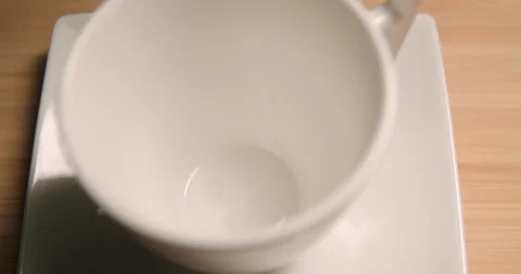 Coffee cup pouring close up 4K Stock Footage 127402894