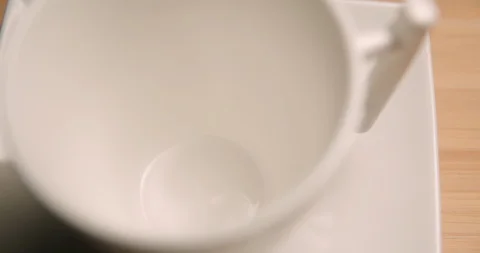 Coffee cup pouring close up 4K Stock Footage 127402972