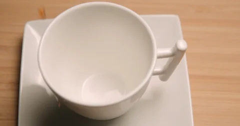 Coffee cup pouring close up 4K 库存影片 127403106