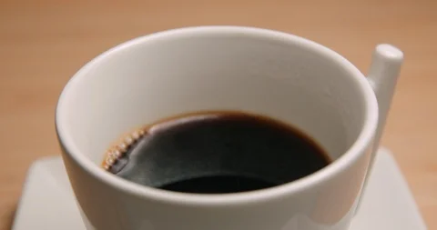 Coffee cup pouring close up 4K Stock-Footage 127403405