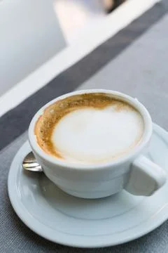 Coffee cup on restaurant table 写真素材