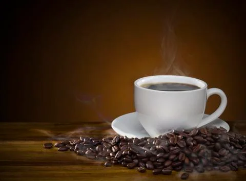 Coffee cup with roasted brown coffee beans and smoke on wooden table. black h Stock Photos
