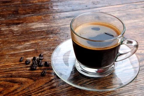 Coffee cup with roasted coffee beans Stock Photos