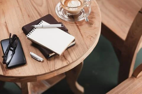 Coffee cup on rustic wood table Stock Photos