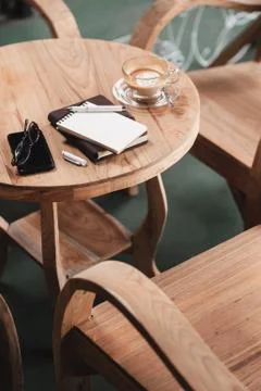 Coffee cup on rustic wood table Stock Photos