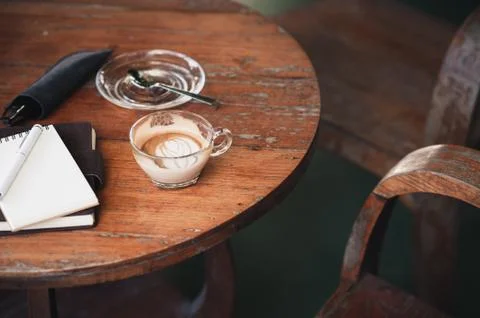 Coffee cup on rustic wood table Stock Photos