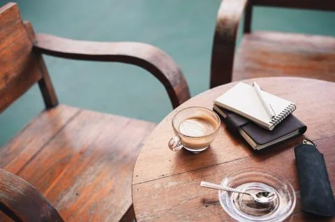 Coffee cup on rustic wood table Stock Photos
