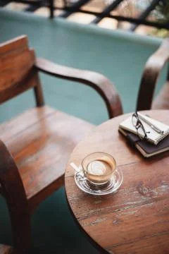 Coffee cup on rustic wood table Stock Photos