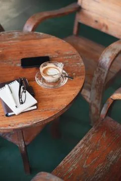 Coffee cup on rustic wood table Stock Photos